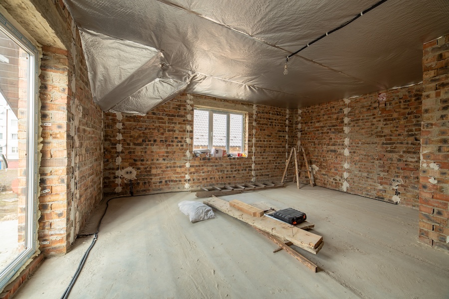 interior of unfinished brick house with concrete f 2026 01 07 00 42 54 utc